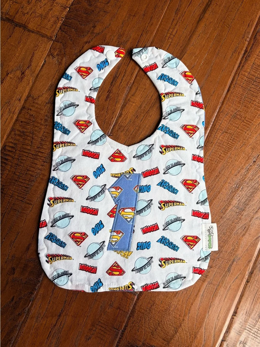 DC Comics Superman White Bib with Blue and Red Accents